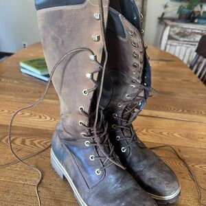 Timberland tall grungy work boots.